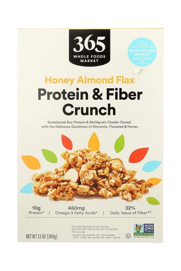 A box of 365 whole foods market honey almond flax protein and fiber crunch cereal.
