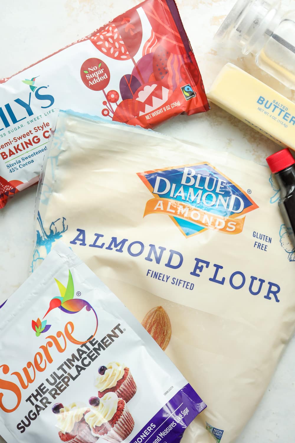 Bags of ingredients on a white table.