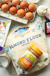 A variety of ingredients on a white table.