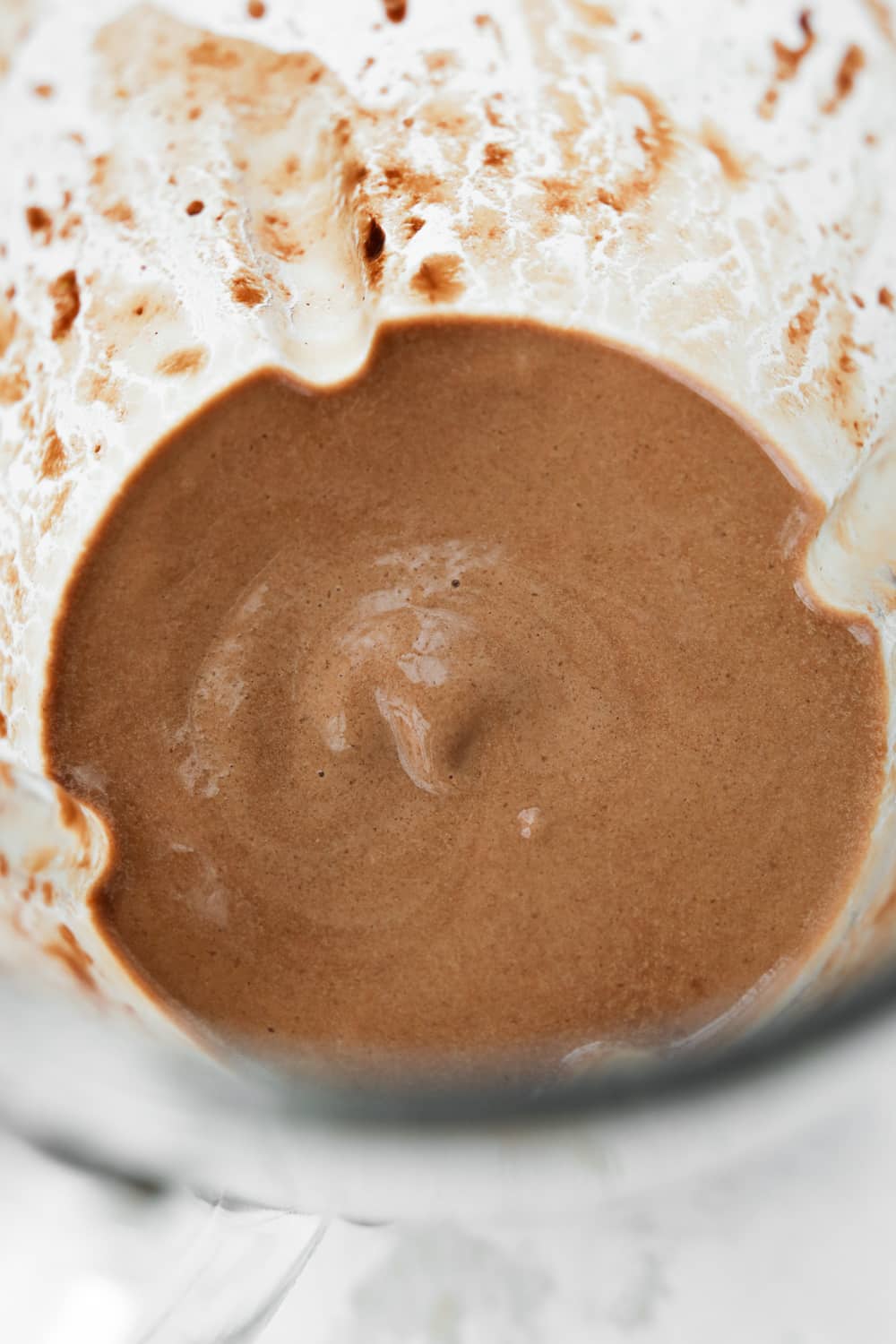 A chocolate frosty in a blender.