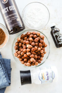 A variety of ingredients on a white table.