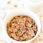 A white bowl filled with cereal.