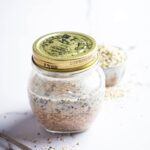 Sealed glass jar filled with keto overnight oats.