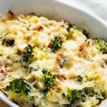 Chicken bacon ranch casserole in a white casserole dish.