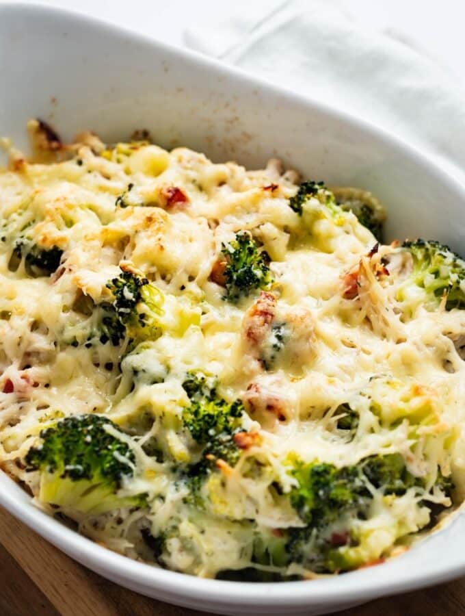 Chicken bacon ranch casserole in a white casserole dish.