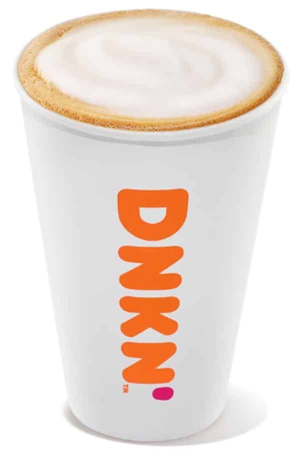 A white cup filled with dunkin donuts hot cappuccino.