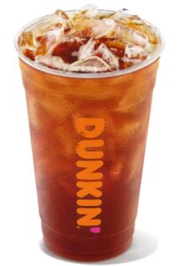 A clear cup filled with dunking donuts iced tea.