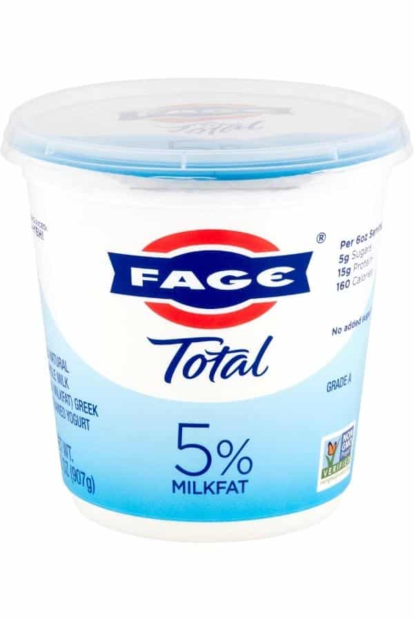 A container of Fage total 5% milkfat yogurt.