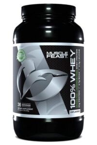 A tub of muscle feast 100% whey protein powder.