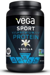 A tub of vega spot premium protein powder.