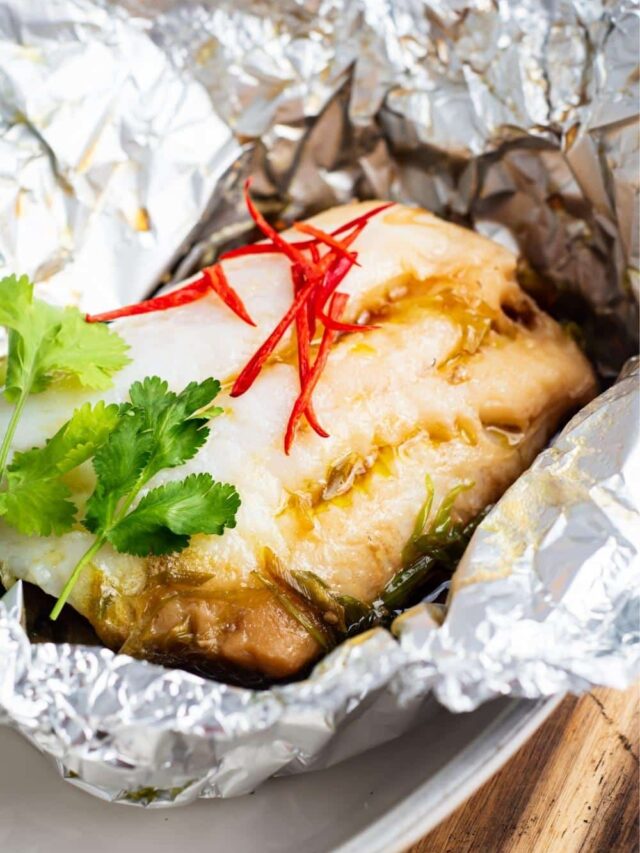 Sea bream in a tin foil basket.