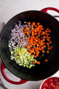 Carrots, celery, and onion in a dutch oven,