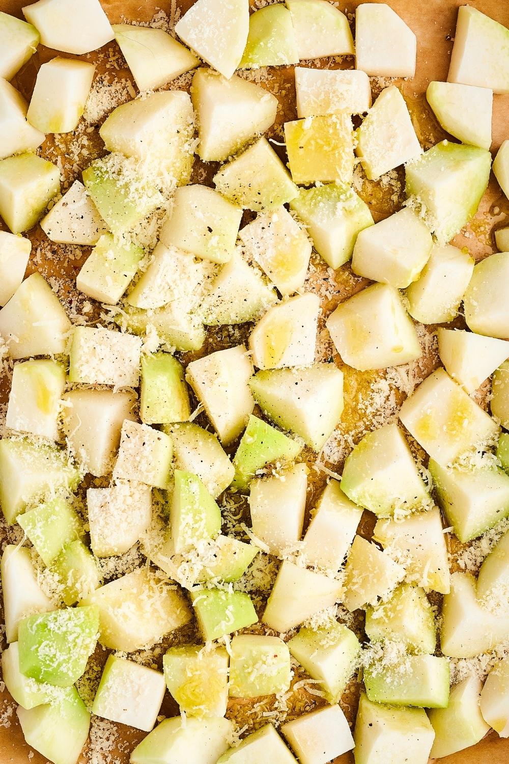 Kohlrabi squares with grated parmesan on top.