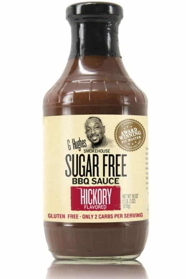 A bottle of G Hughes sugar free BBQ sauce hickory flavor.