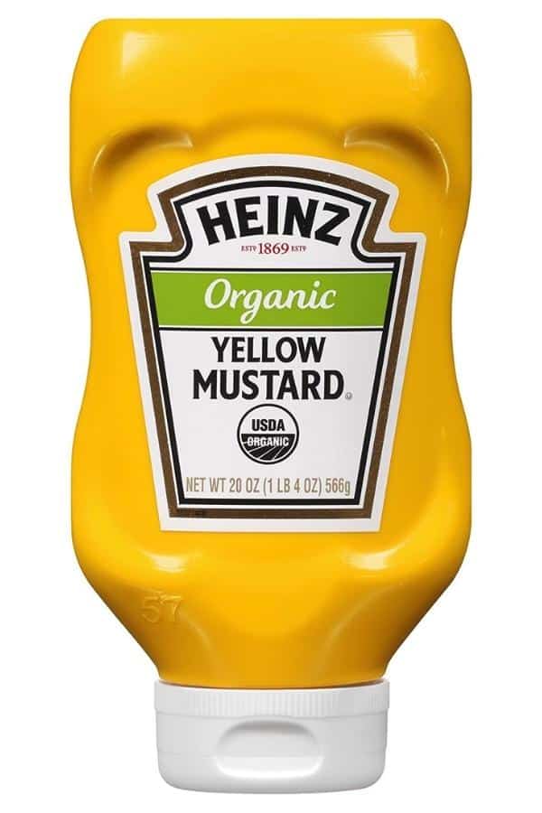 A bottle of Heinz organic yellow mustard.