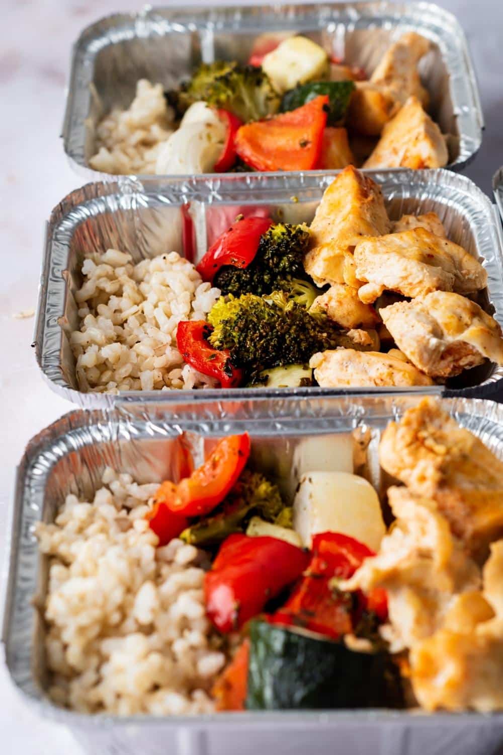 Meal Prep Lunch Bowls with Spicy Chicken, Roasted Lemon Broccoli