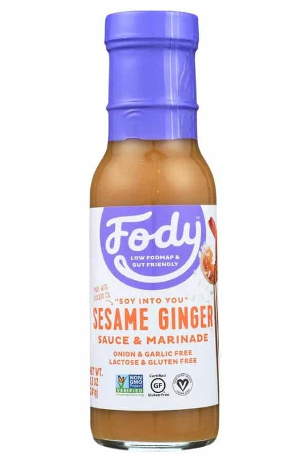 A bottle of body sesame ginger sauce and marinade.