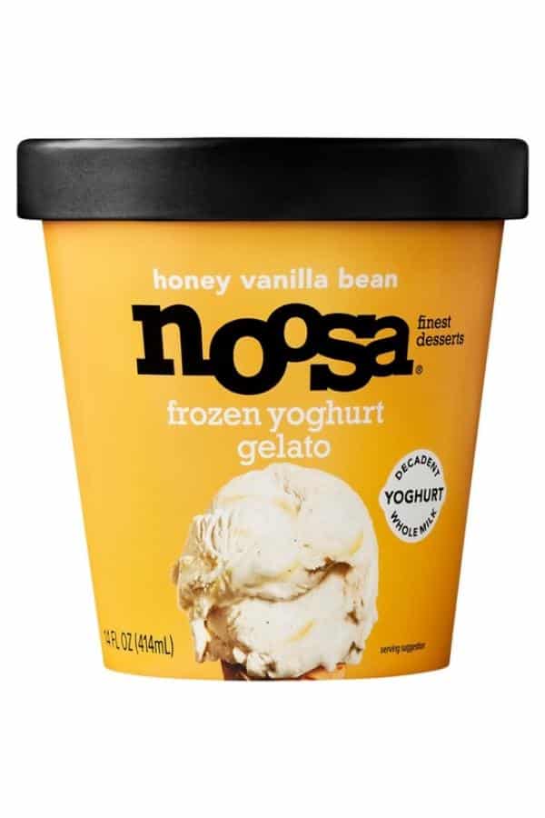 A tub of noosa honey vanilla bean frozen yoghurt gelato.