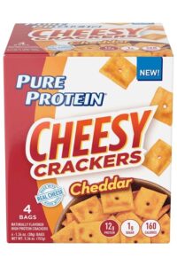 A box of Pure Protein cheesy cheddar crackers.