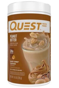 A tub of Quest peanut butter protein powder.