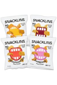 Four bags of Snacklins plant crisps.