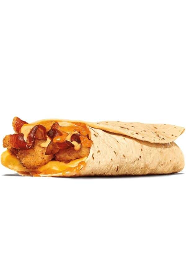 A breakfast burrito with bacon, eggs, cheese, and hashbrowns in a tortilla.