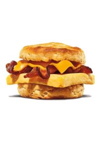 Biscuit with cheese, bacon, and an egg between it