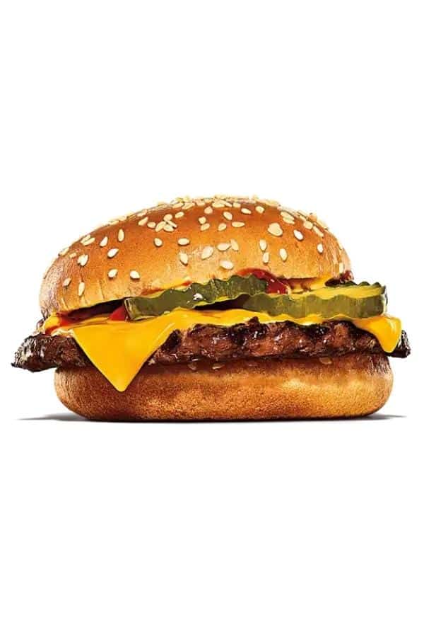 A cheeseburger with ketchup, mustard, and pickles on it.