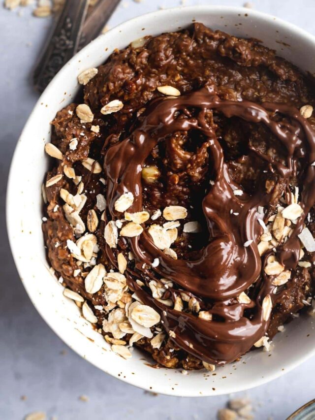 Protein oatmeal in part of a white bowl.