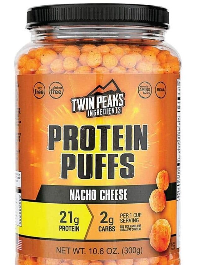 Clear tub of Twin Peaks protein puffs nacho cheese flavor.