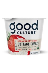 A container of good culture strawberry cheer cottage cheese.