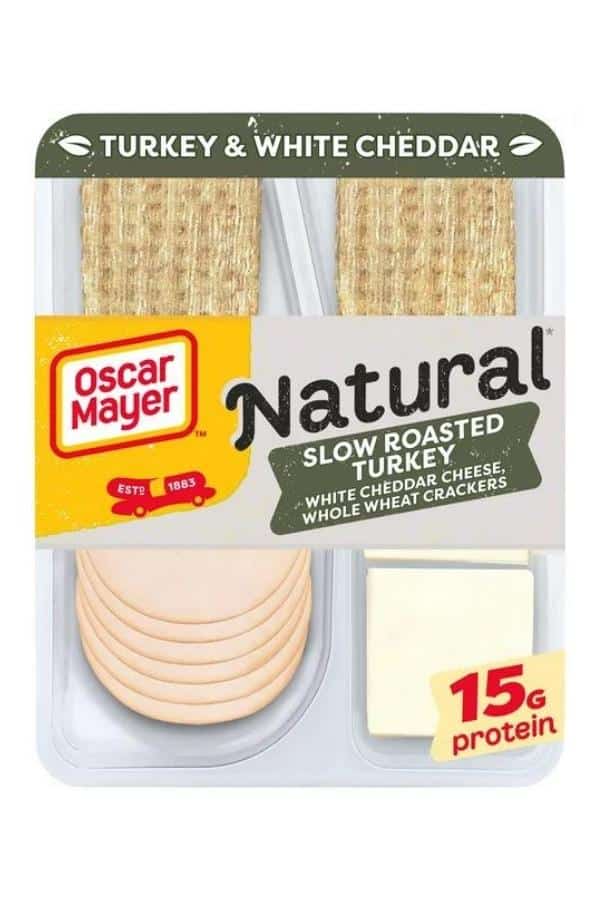 A box of Oscar Mayer natural slow roasted turkey with white cheddar cheese and whole wheat crackers.