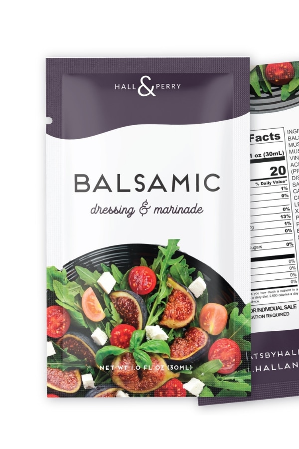 A packet of hall & perry balsamic dressing and marinade.