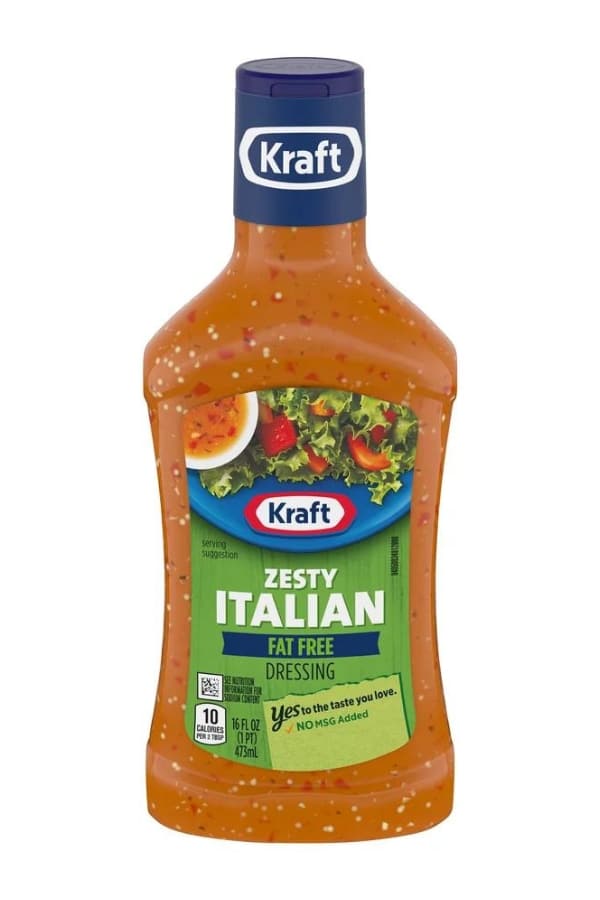 A bottle of kraft fat free zesty italian dressing.