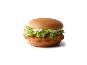 A crispy chicken sandwich with lettuce and mayo on it.