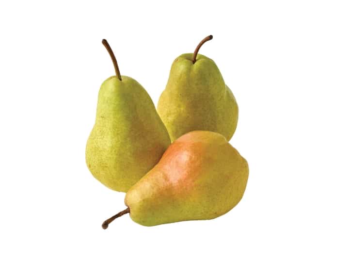 A pear on its side in front of two pears standing upright.