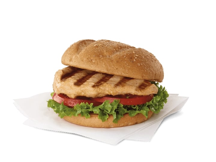 A Chick-Fil-A grilled chicken sandwich with lettuce and tomato.