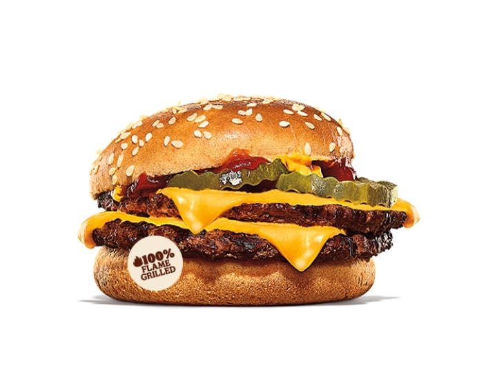A Burger King mcdouble cheeseburger with pickles, mustard, and ketchup.