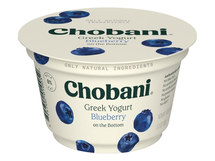 A container of Chobani blueberry Greek yogurt.
