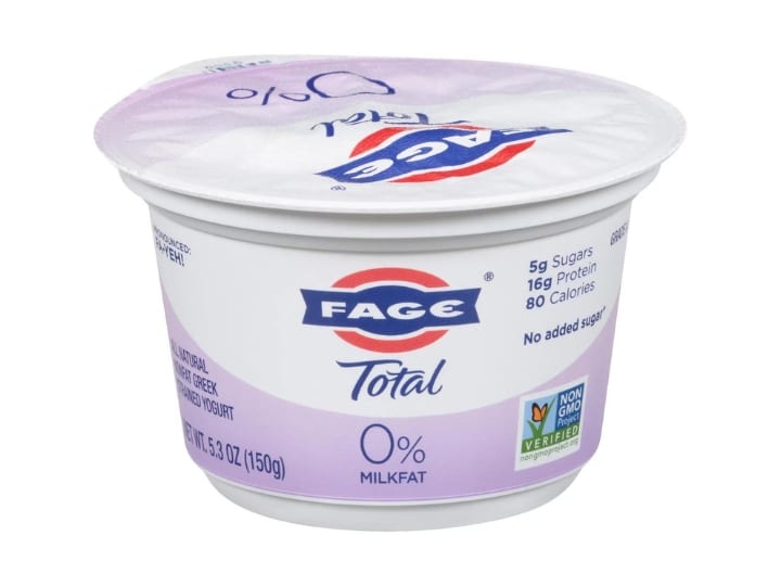 A container of Fage total 0% milkfat yogurt.