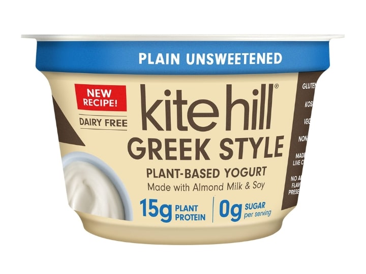 A container of Kite Hill plain unsweetened plant based yogurt.