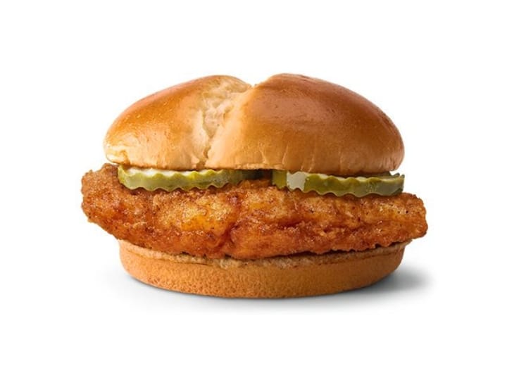 A McDonald's crispy chicken sandwich with pickles.