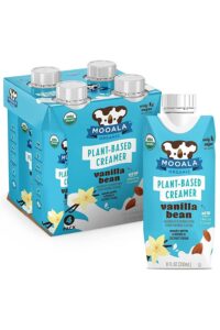 A small box of mooala plant based vanilla bean creamer. Behind it is four pack of the creamer.