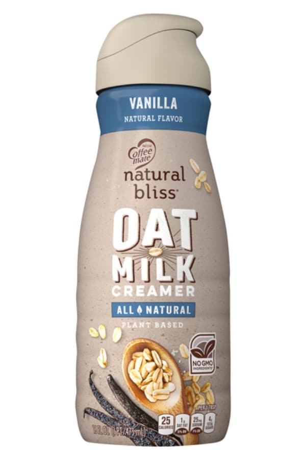 A container of natural bliss oat milk creamer.