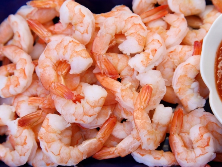 A bunch of cooked shrimp.