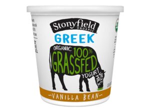 A tub of Stonyfield Greek vanilla bean yogurt.