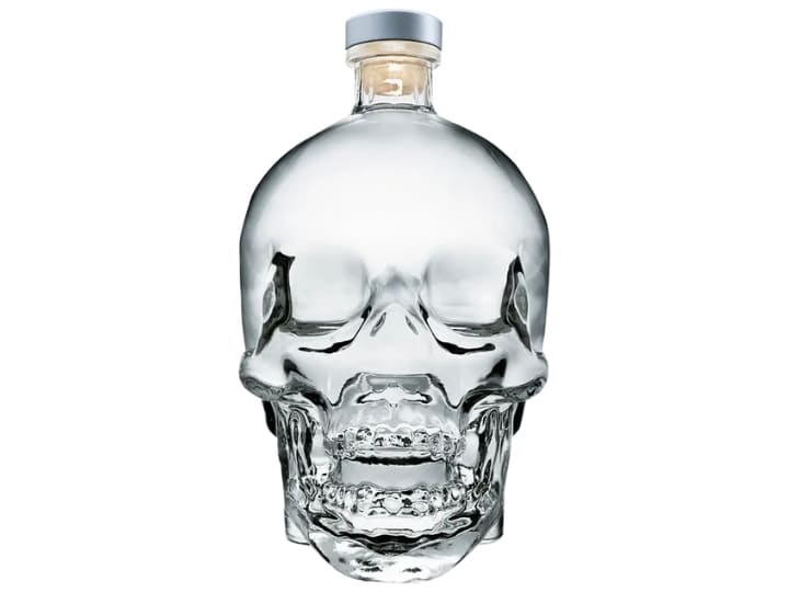 A skull glass bottle of crystal head vodka.