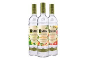 Three bottles of Ketel One botanical vodka. There's cucumber and mint, peach and orange blossom, and grapefruit and rose.