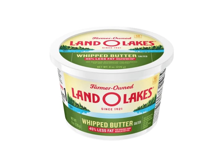 A tub of Land O Lakes whipped butter.