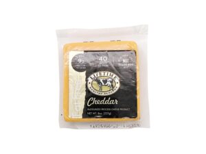 A package of Lifetime cheddar cheese slices.